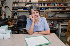Mary Mellon at her volunteer job in AFC's pharmacy